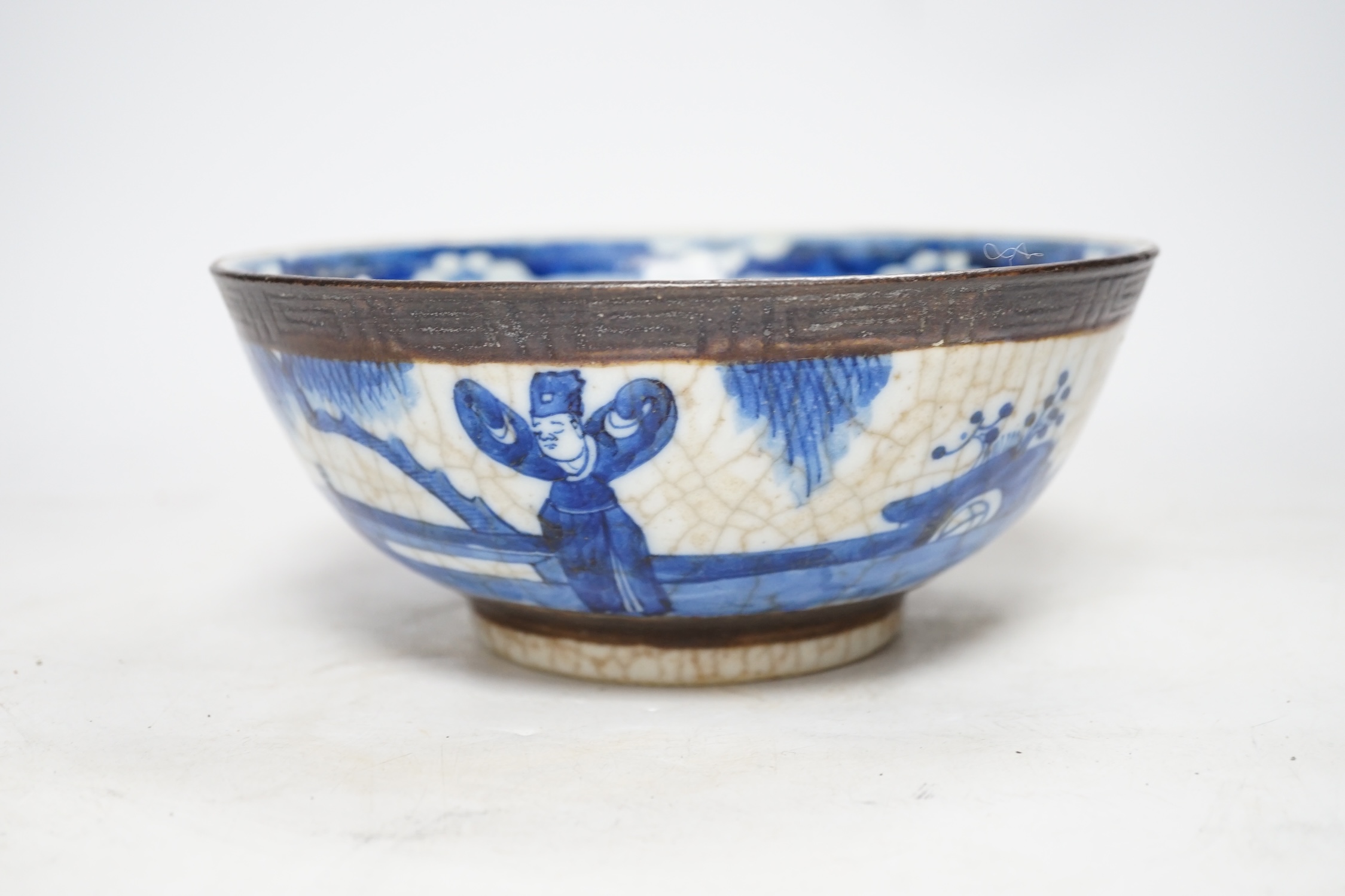 A Chinese blue and white crackle glazed bowl, early 20th century, 21cm diameter